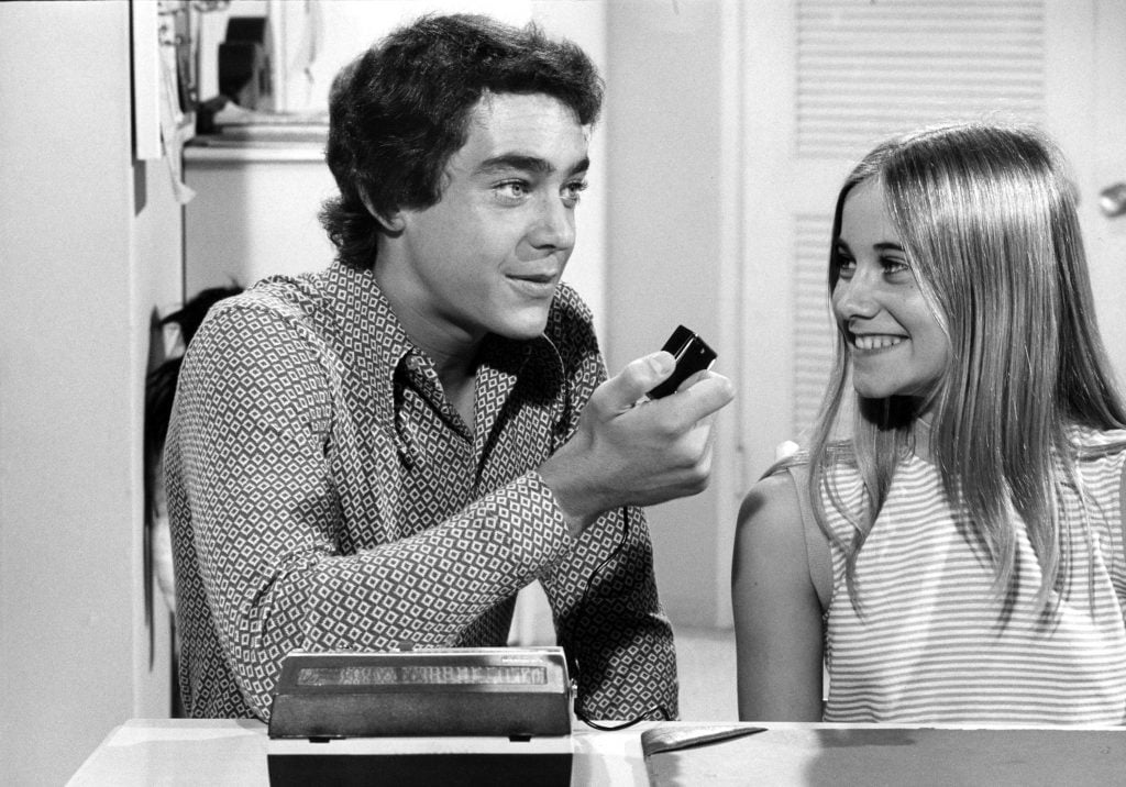 Greg (Barry Williams) and Marcia (Maureen McCormack) plot their revenge against Peter in season three of The Brady Bunch