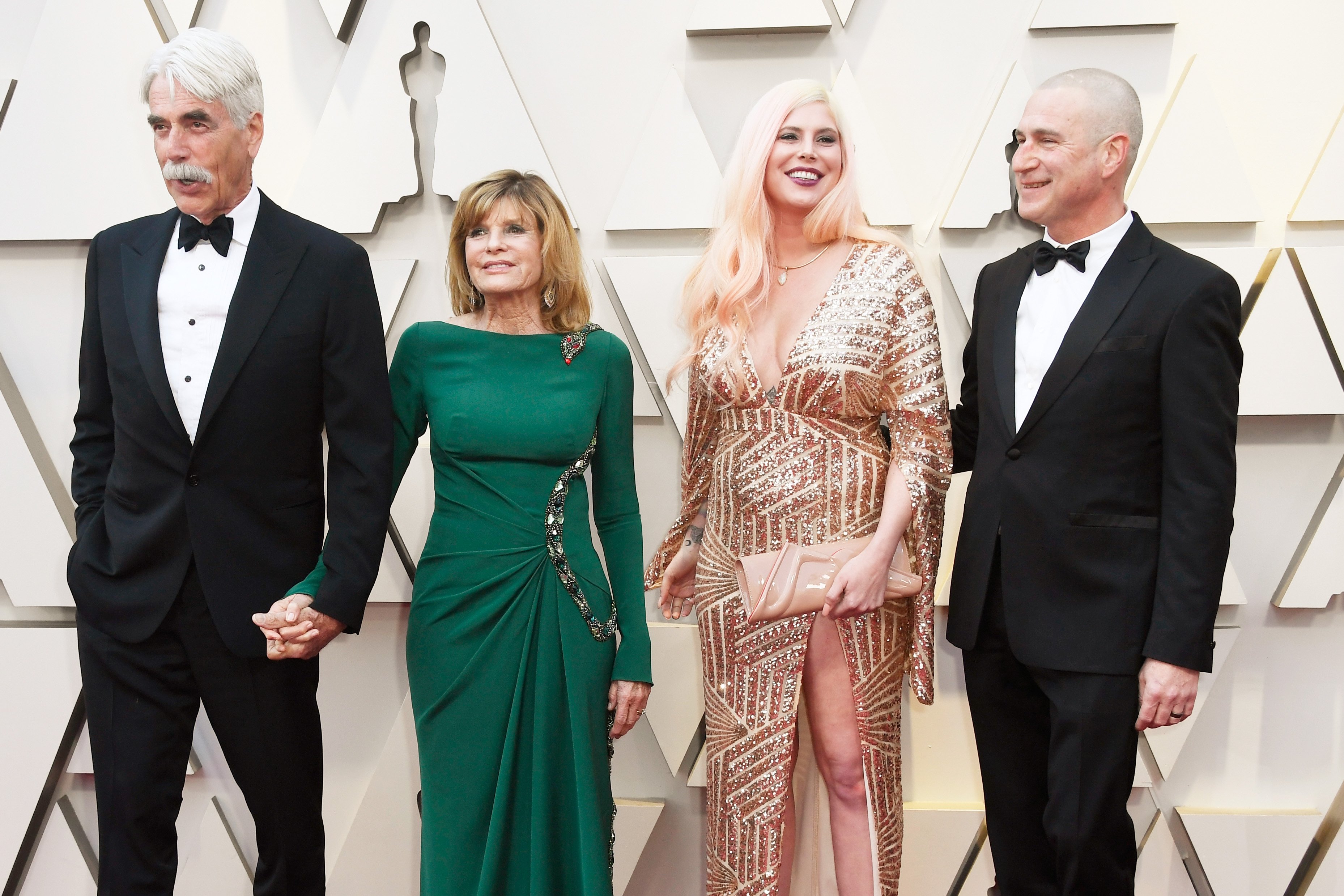 Sam Elliott with wife Katharine Ross and daughter Cleo Rose Elliott posing on red carpet at 91st Annual Academy Awards