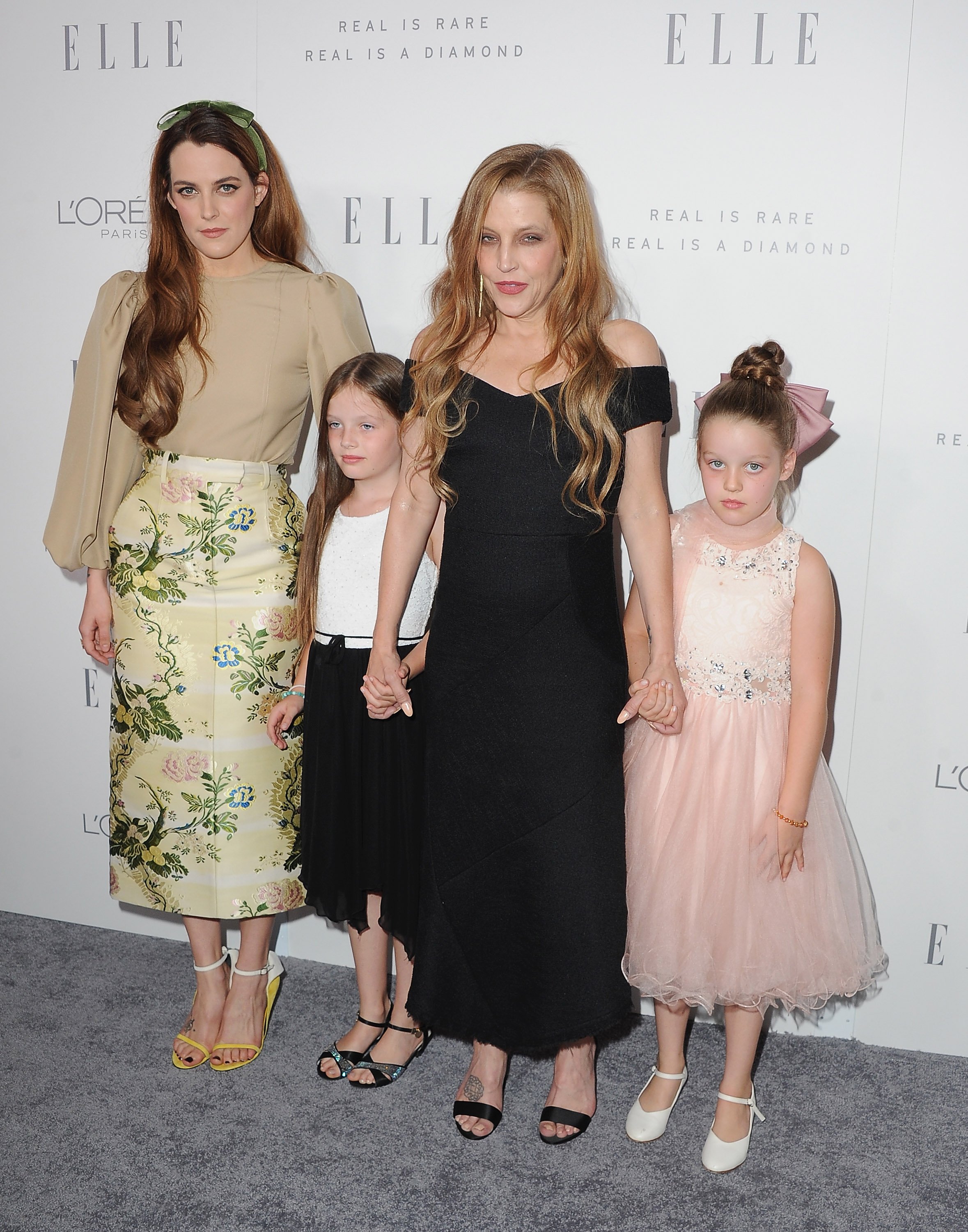Lisa Marie Presley and daughters Harper Finley and Riley
