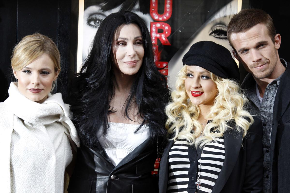 Cher in 2010 with her 'Burlesque' cast