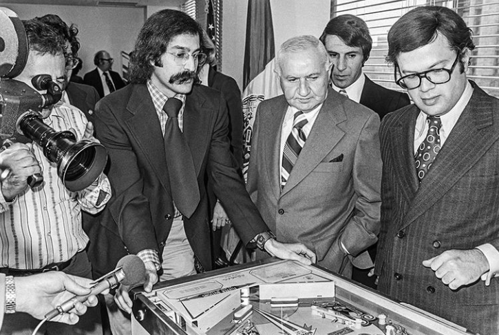 Roger Sharpe playing Pinball in front of NYC council