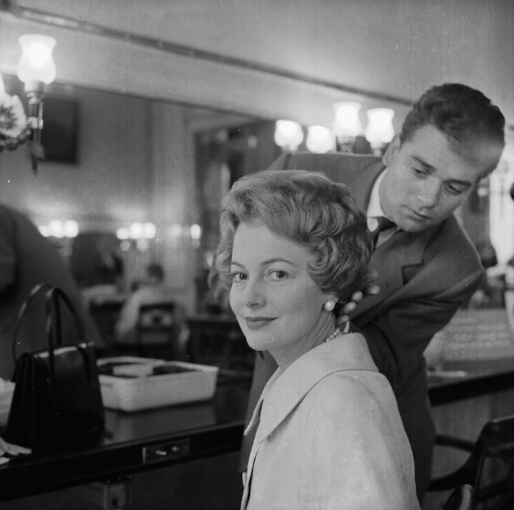 Olivia de Havilland in 1958 getting hair/makeup done