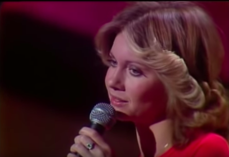 Olivia Newton-John sings "Have You Never Been Mellow"