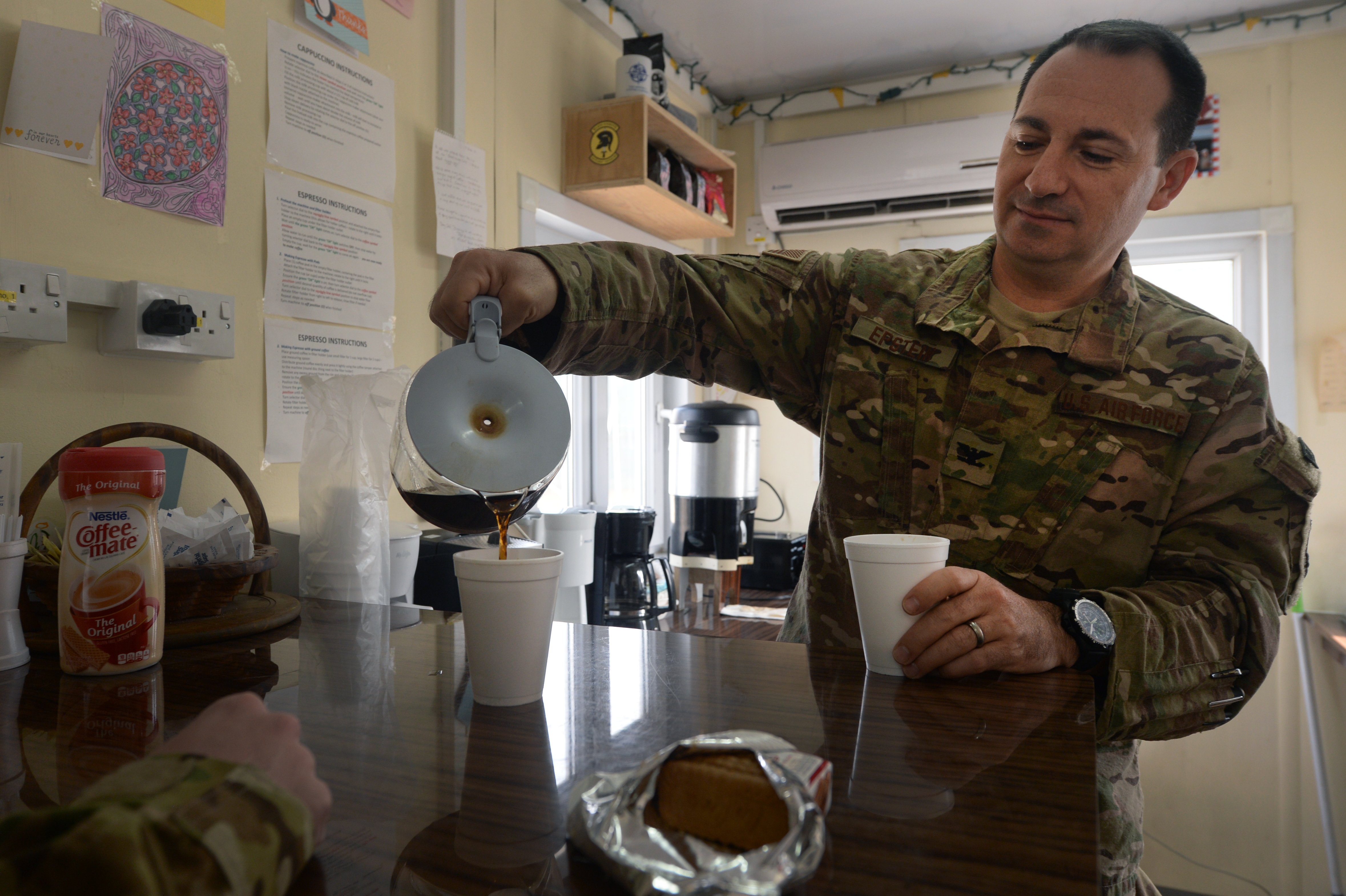 army soldier drinking coffee