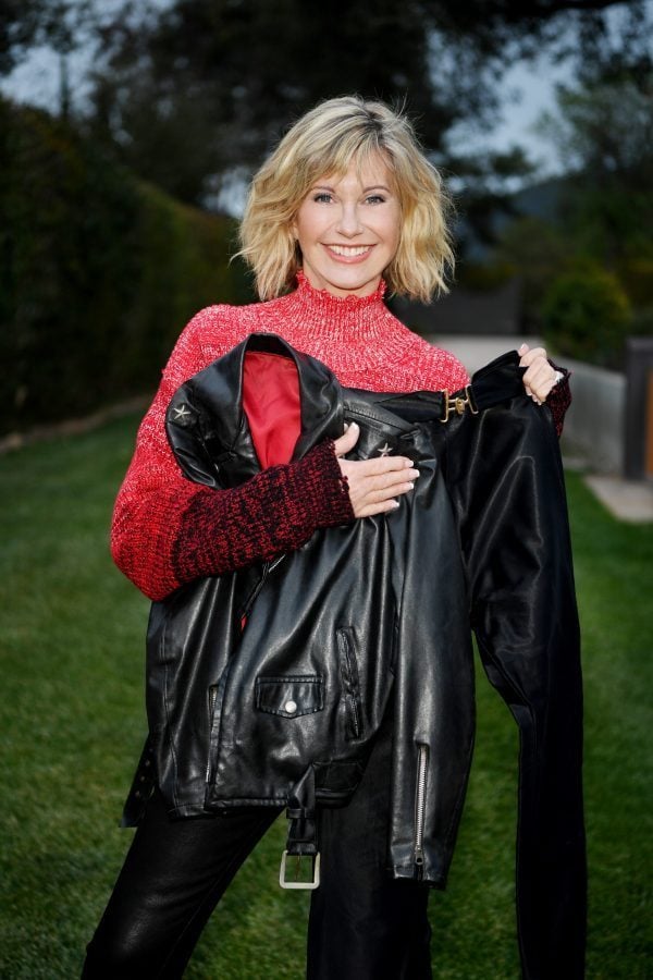 olivia newton-john with her grease costumes