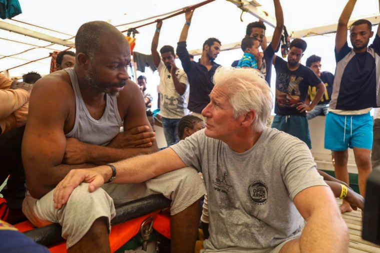 richard gere with migrants