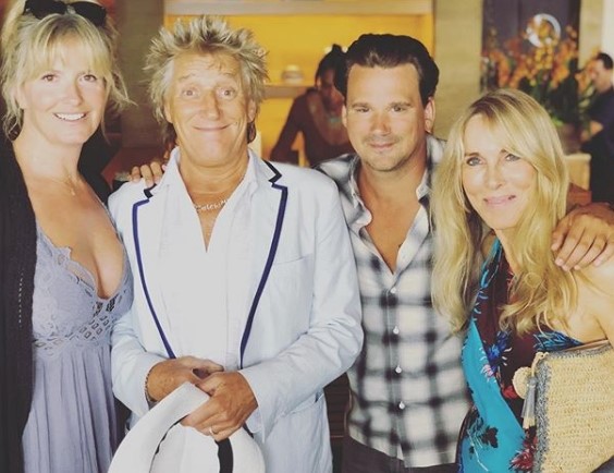 rod stewart goofy face with family