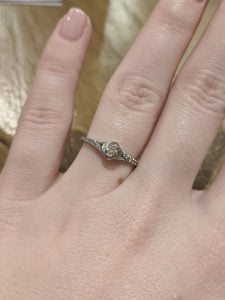 Emily T. prefers small engagement rings because of her job