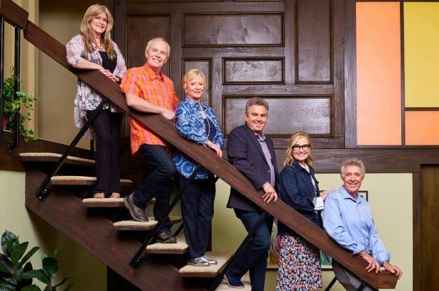 the brady bunch siblings on the stairs 