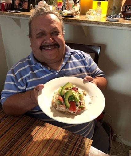chuy bravo showing plate of food 