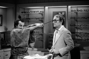 Henry appeared with John Belushi on SNL for the 1978 Samurai Optometrist sketch