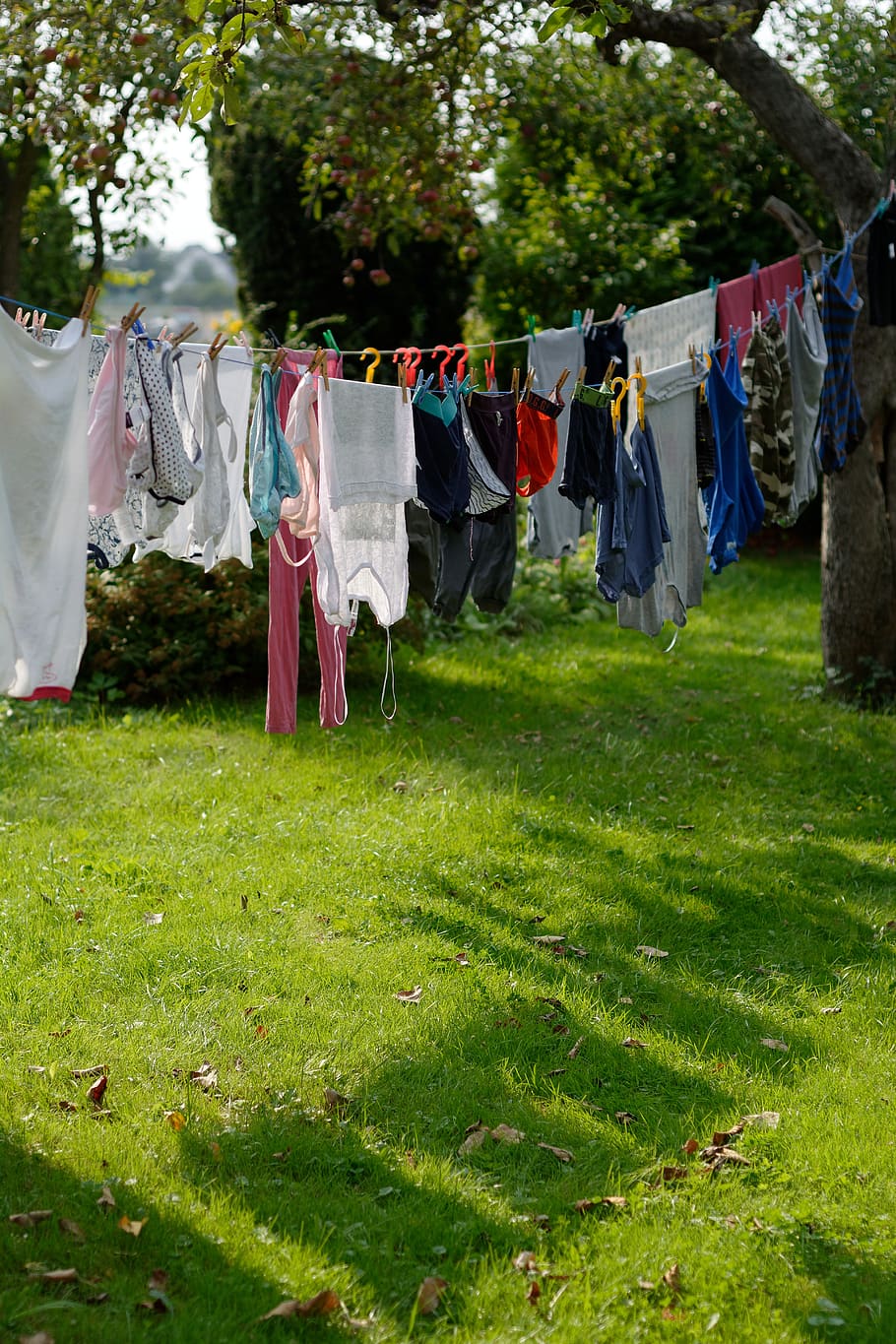 clothes hanging on a clothesline to dry 