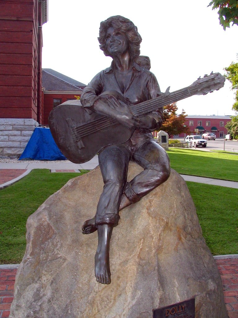 dolly parton statue with guitar 