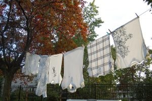 In less dense areas, clotheslines could be two poles, a rope, and possibly some clips