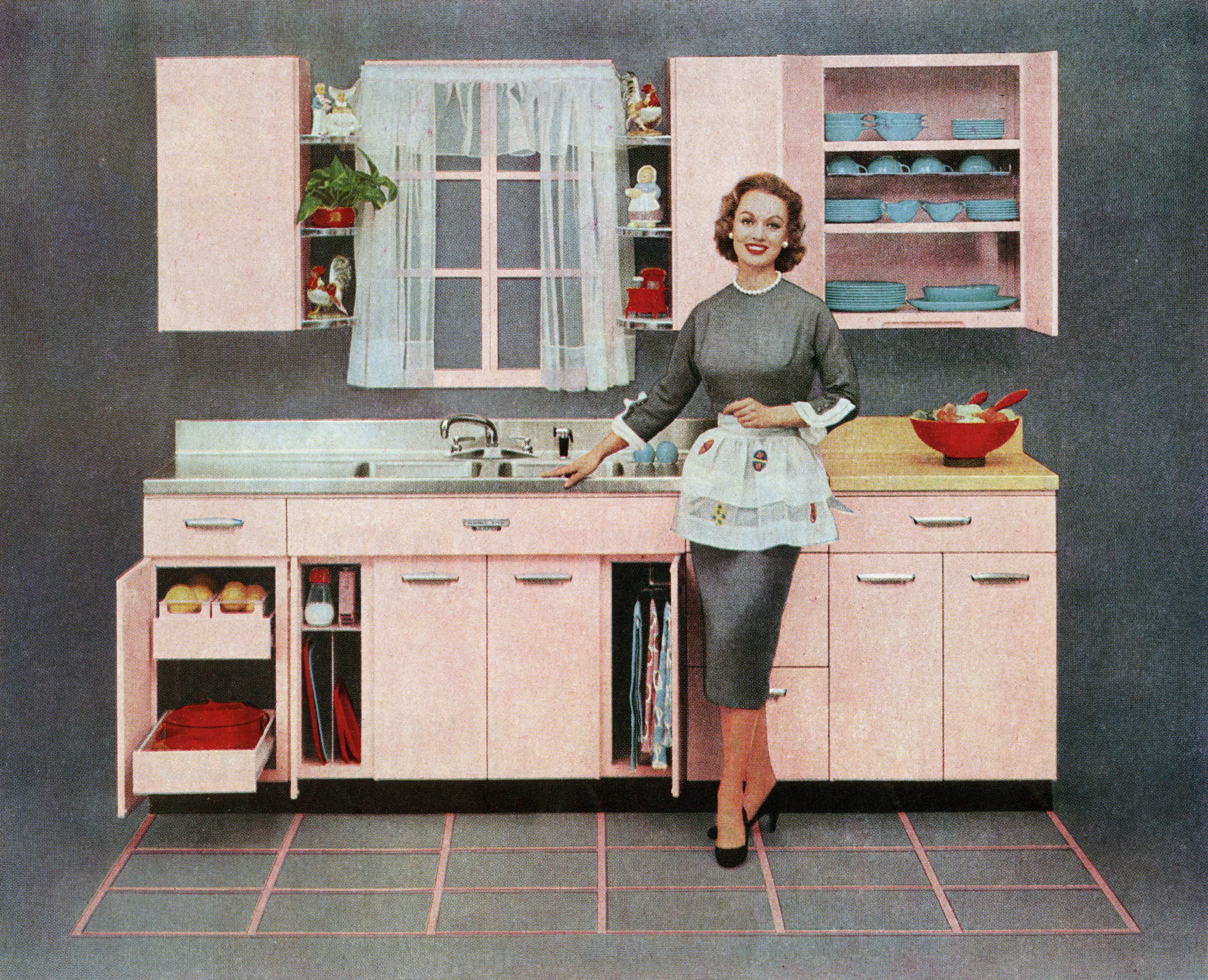 housewife standing in the kitchen 