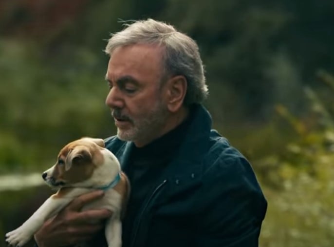 neil diamond and a puppy in his music video