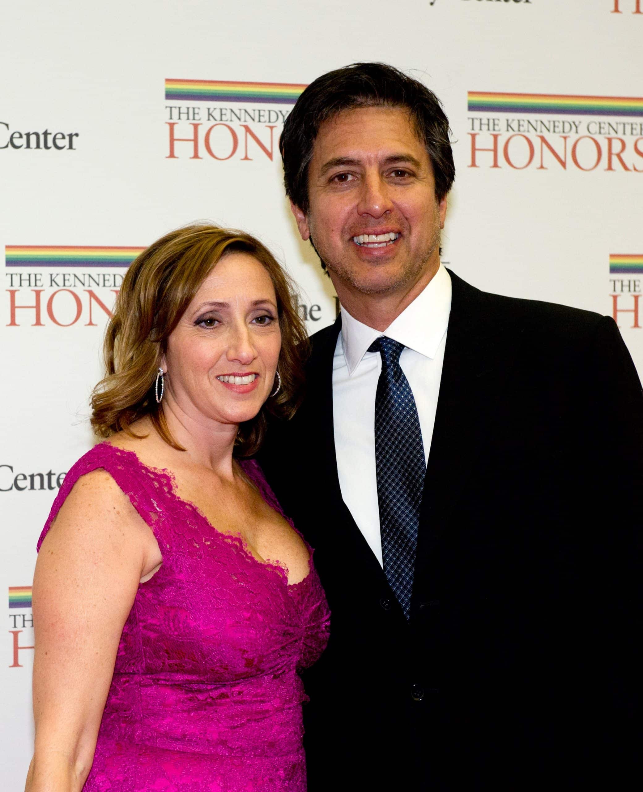 ray romano and his wife anna on a red carpet 