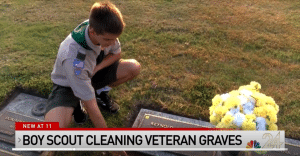 Andrew Baker cleans graves belonging to fallen veterans at the local cemetery / NBC screenshot