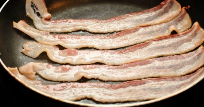 How You Should Cook Your Bacon For The Perfect Texture And No Oil Splattering