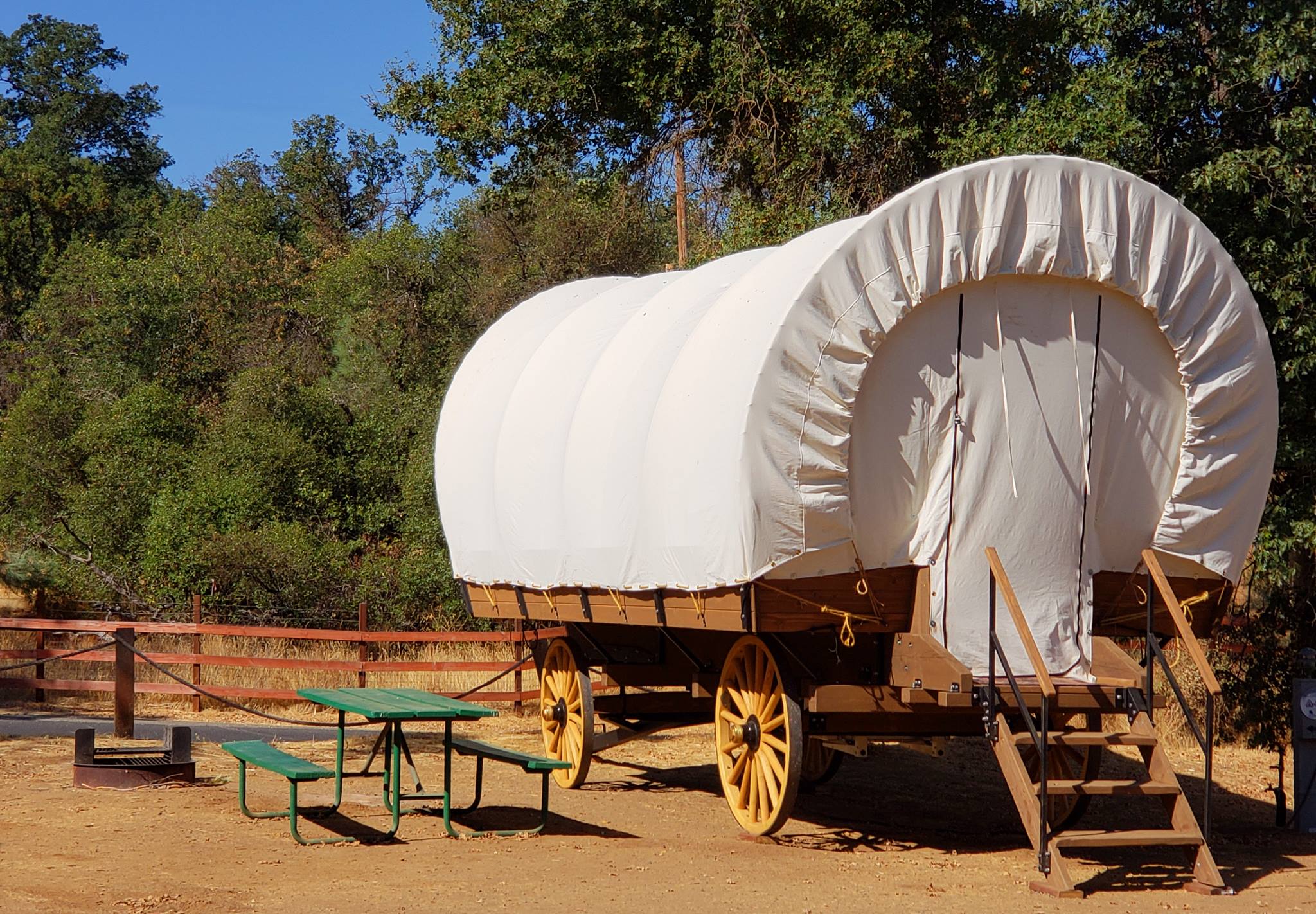 pretend-you-are-a-pioneer-in-covered-wagon-cabins-near-yosemite