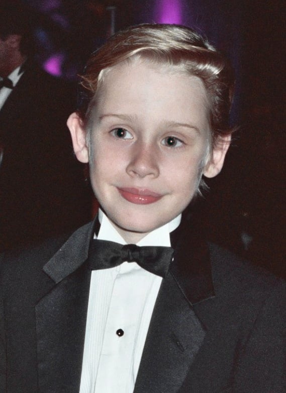 Macaulay Culkin in a tuxedo 