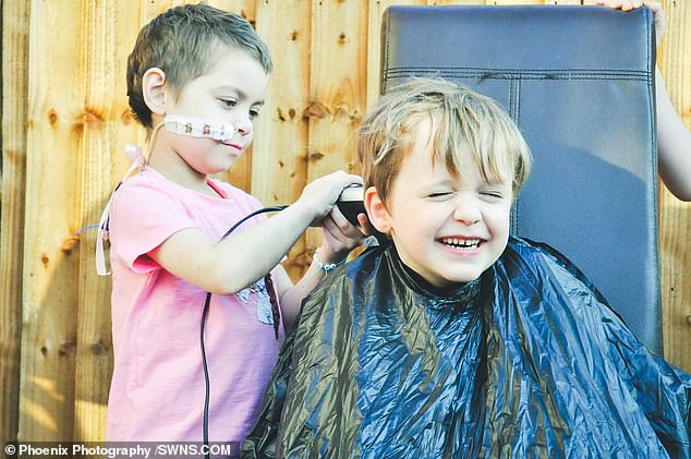 lulu shaving best friend's head