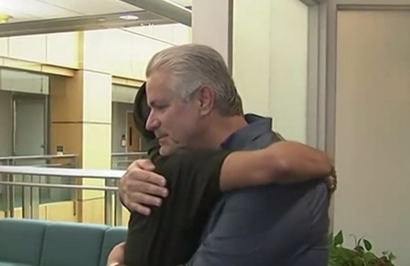 Officer Michael Buelna and Robin Barton reunite