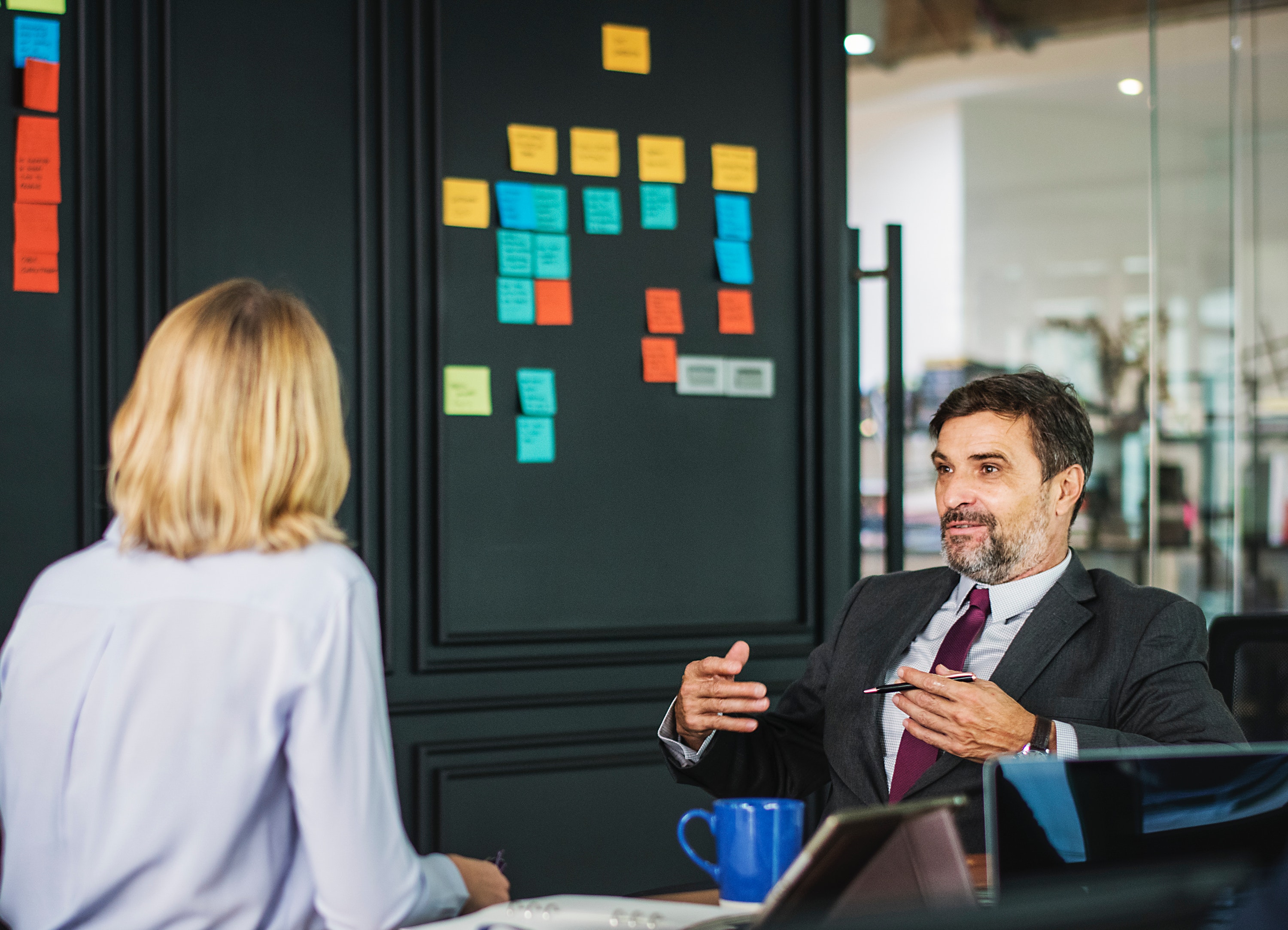 people talking in an office