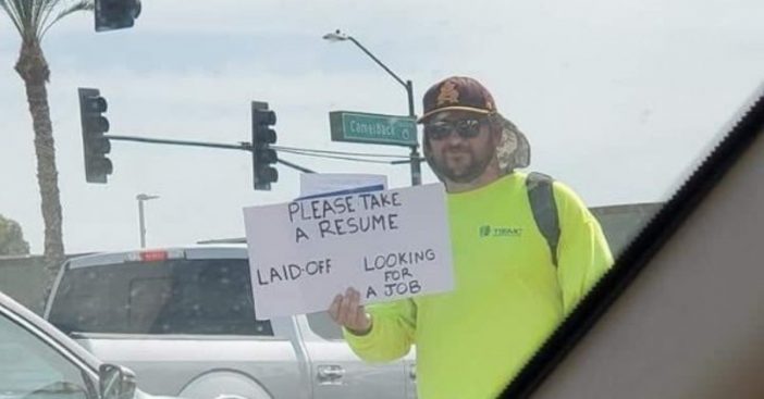 One man took to the streets to hand out resumes after he got laid off