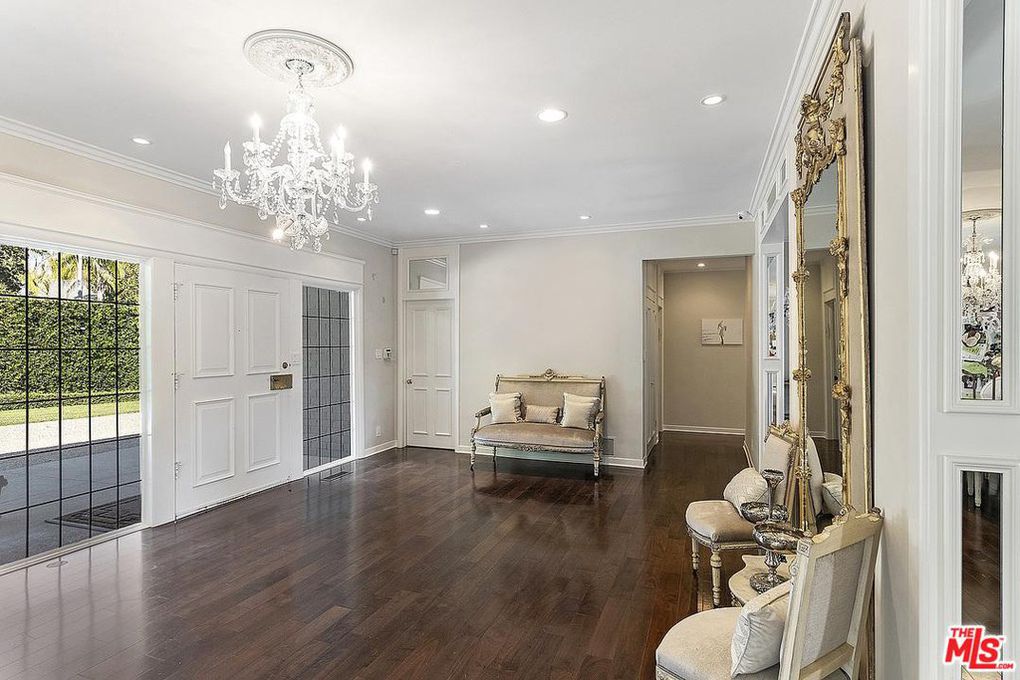 living room with chandelier 