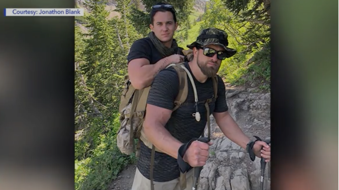 A veteran carried a fellow Marine up a mountain after he lost his legs in Afghanistan