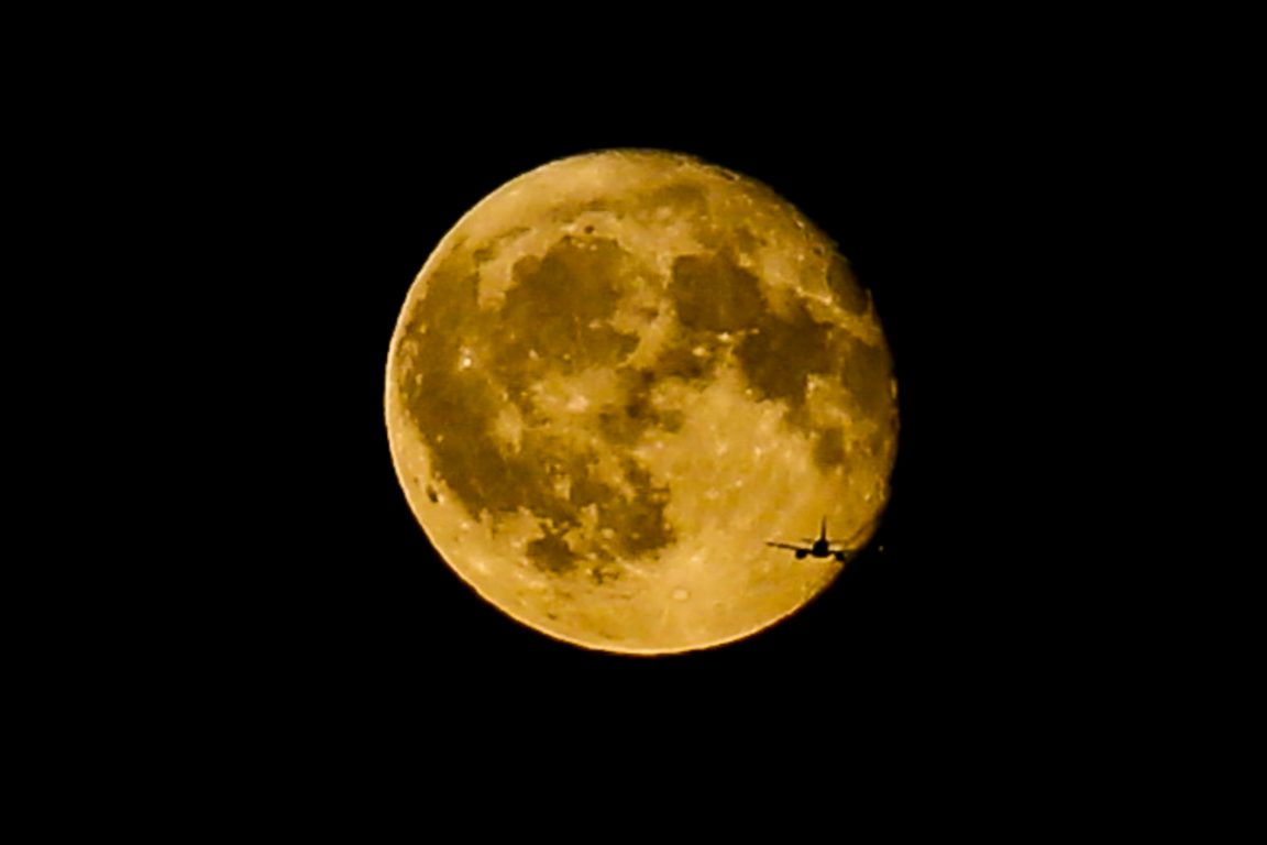 How To View The Rare Harvest Moon On Friday The 13th This Week!
