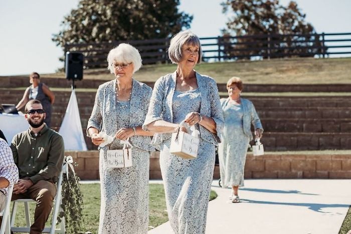 bride has her 4 grandmas as flower girls in wedding