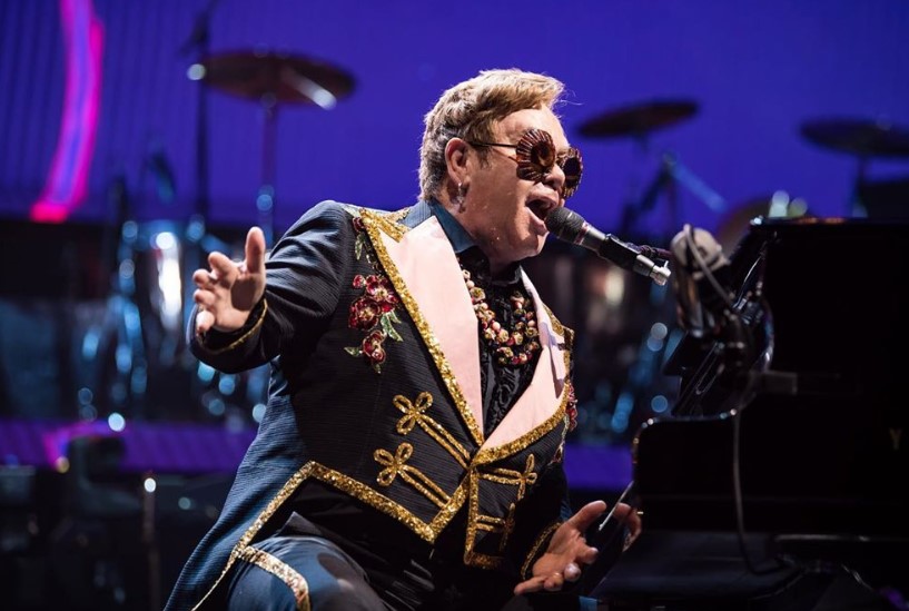 elton john performing on tour 