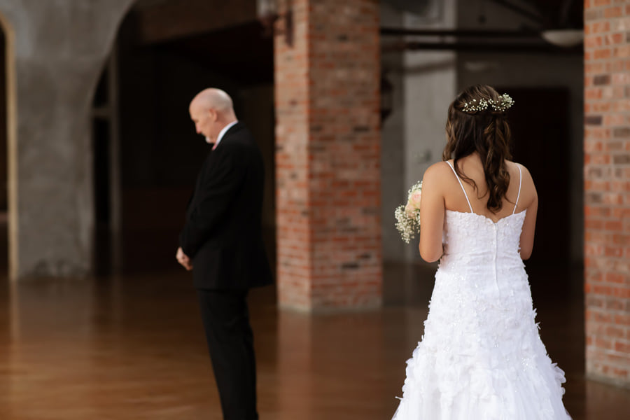 father daughter first looking wedding photos 