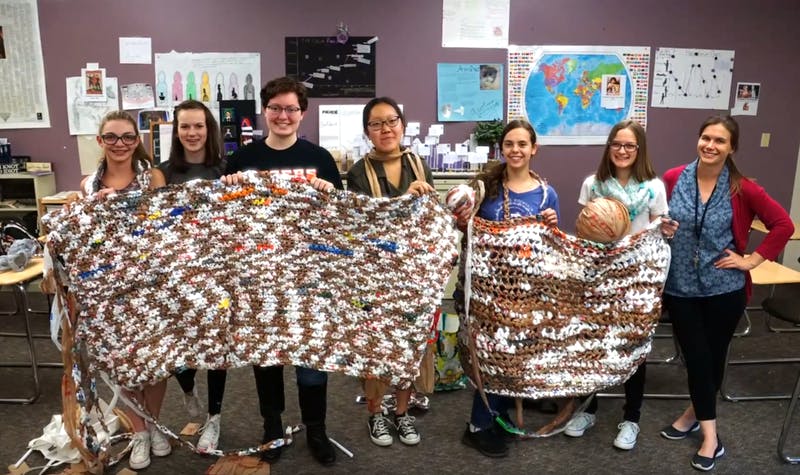 High school students reuse plastic bags for homeless