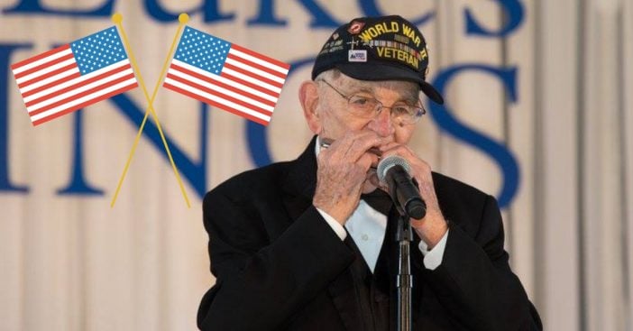 96 year old veteran Pete Dupre plays a rendition of the national anthem on the harmonica
