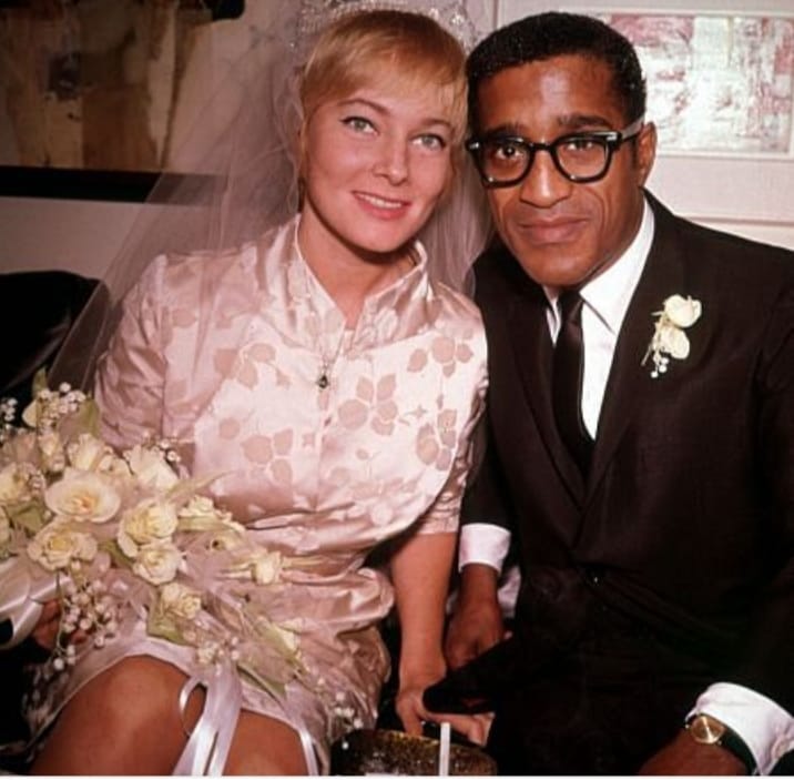 Sammy Davis Jr. marrying his bride, May Britt.