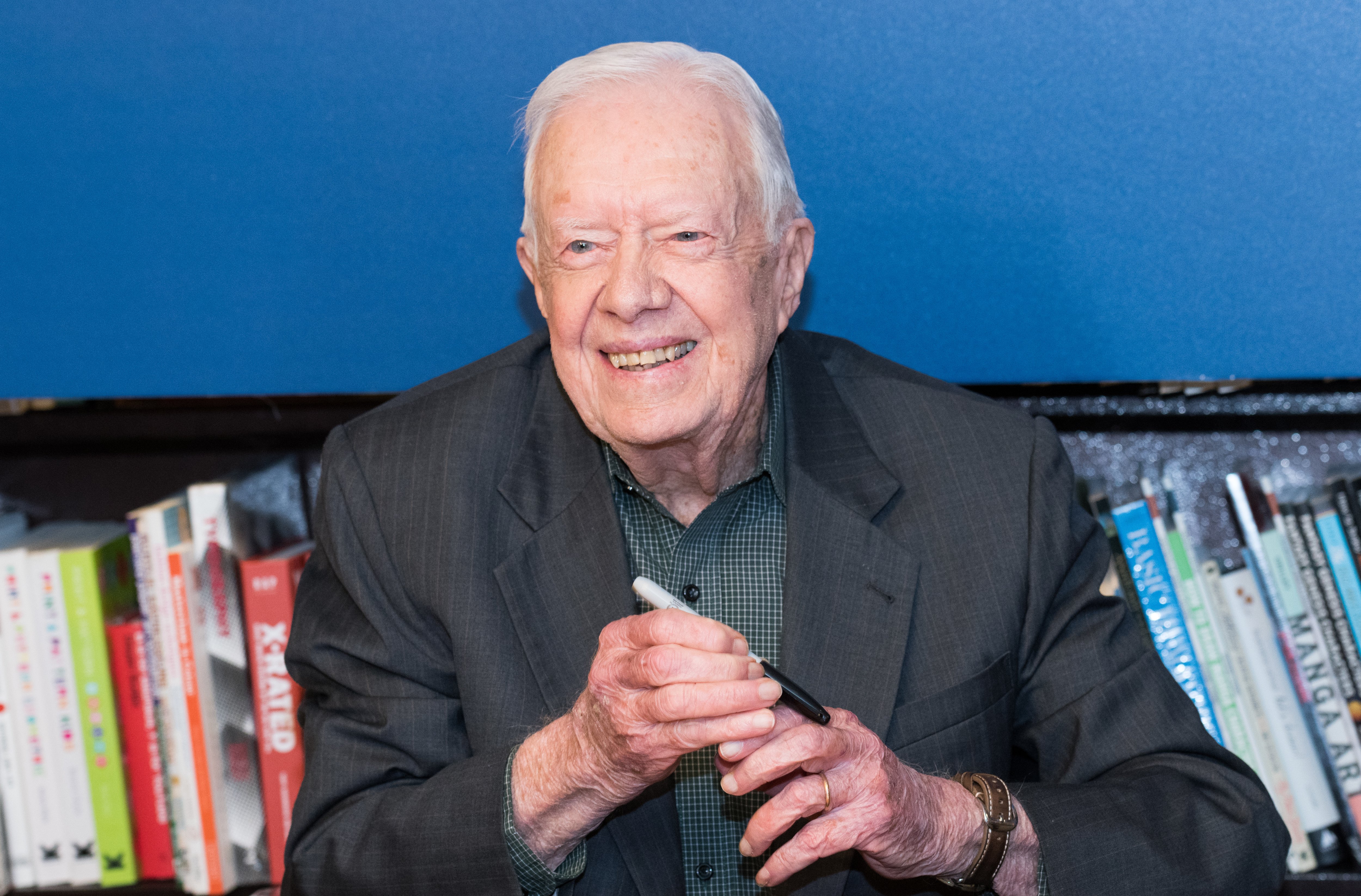 former president jimmy carter signing books 