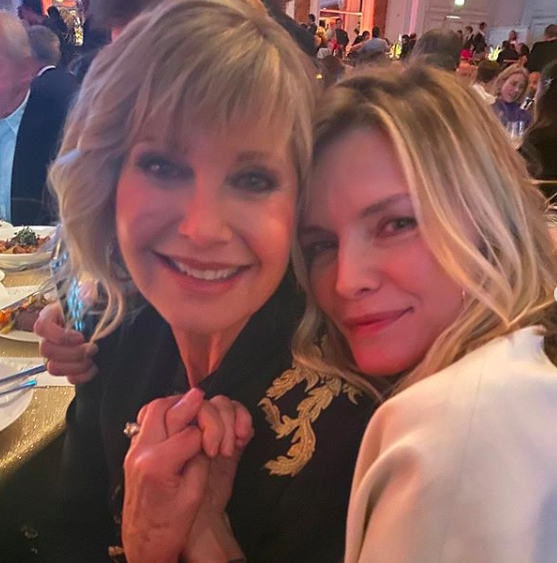 olivia newton-john shares photo with grease 2 star michelle pfeiffer