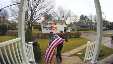 FedEx Driver Stops On His Route To Pick Up And Fold American Flag