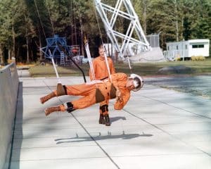 CBS EVENING NEWS anchor Walter Cronkite (front) using the reduced gravity simulator at NASA's Langley Research Center, Hampton, Virginia