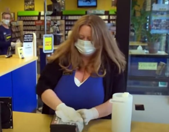 manager cleaning dvds during coronavirus outbreak blockbuster