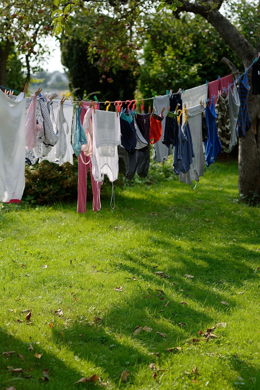 clothes hanging on a clothesline to dry