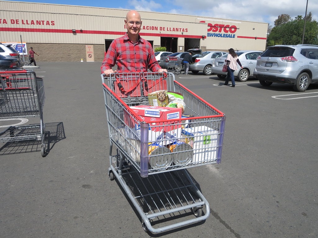 person leaving costco with cart 