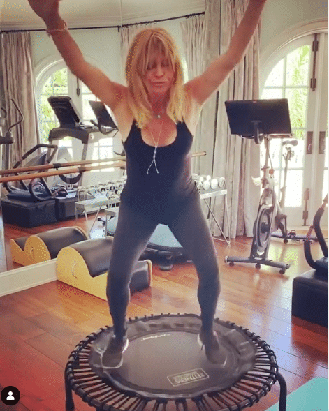 goldie hawn sports blank tank and leggings for workout video