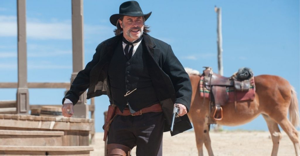 You Need To Watch This John Travolta Western That's Dominating Netflix