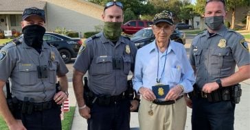 police officers help veteran celebrate 100th birthday