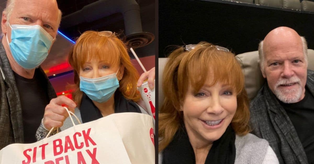 reba mcentire rex linn cozy up for movie theatre date