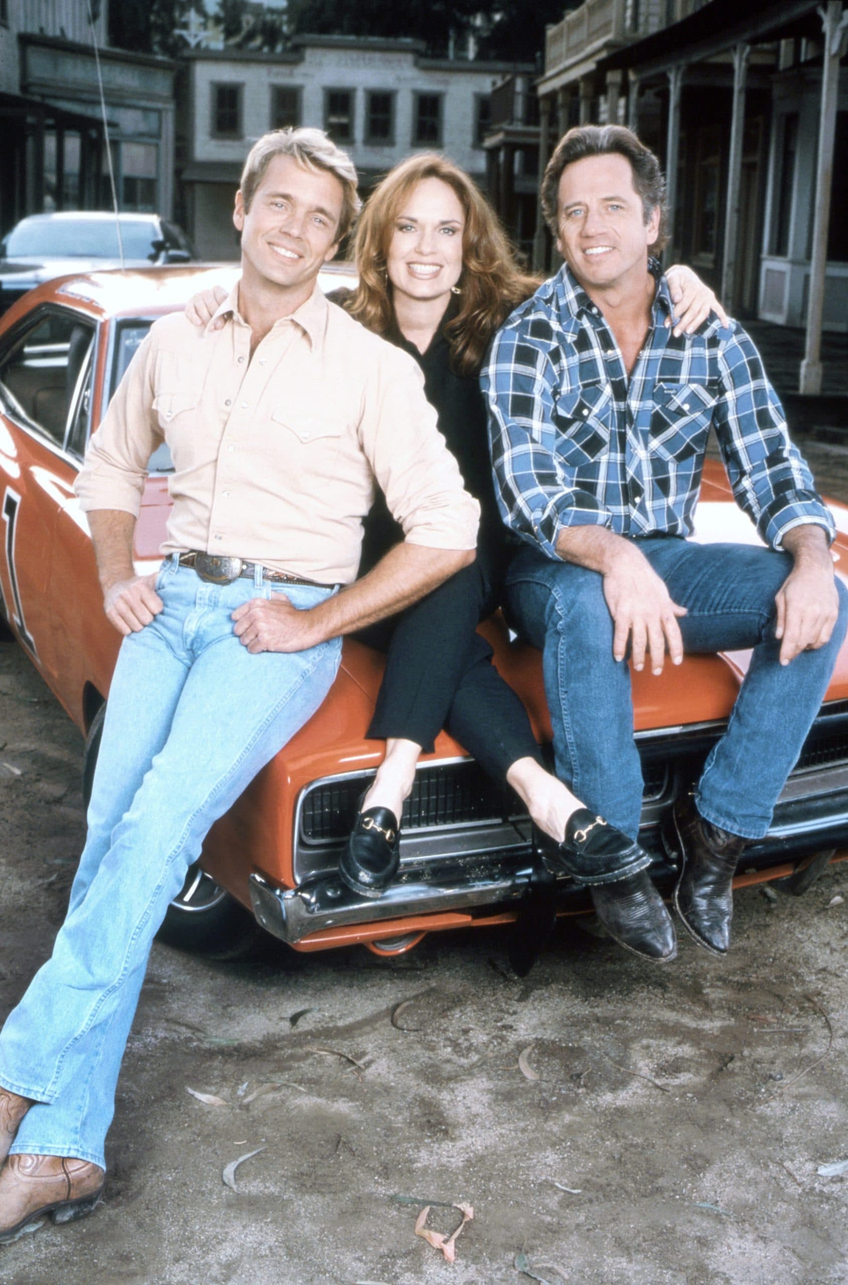 THE DUKES OF HAZZARD: REUNION!, (from left): John Schneider, Catherine Bach, Tom Wopat